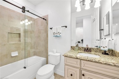 Welcome to elegant coastal living in sought after Fiddler's on The Golf Club At Fiddlers Creek in Florida - for sale on GolfHomes.com, golf home, golf lot