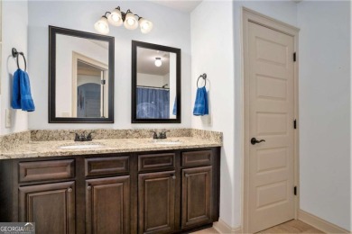 Discover this stunning Craftsman-style home featuring 4 bedrooms on Canongate At Georgia National Golf Club in Georgia - for sale on GolfHomes.com, golf home, golf lot