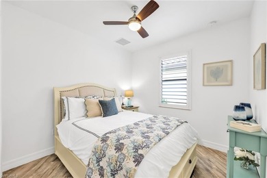 Welcome to elegant coastal living in sought after Fiddler's on The Golf Club At Fiddlers Creek in Florida - for sale on GolfHomes.com, golf home, golf lot