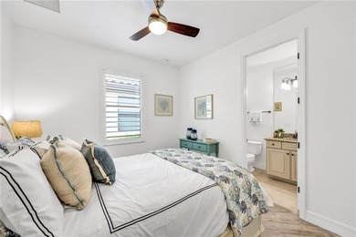 Welcome to elegant coastal living in sought after Fiddler's on The Golf Club At Fiddlers Creek in Florida - for sale on GolfHomes.com, golf home, golf lot