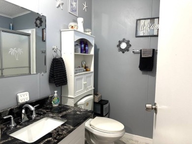 STEP INTO THIS BEAUTIFULLY UPDATED 2-BEDROOM 2-BATHROOM HOME! on Anglers Green Golf Course in Florida - for sale on GolfHomes.com, golf home, golf lot