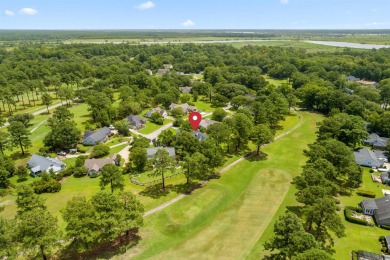 Nestled within a prestigious golf community, this immaculate on Wedgefield Plantation Golf Club in South Carolina - for sale on GolfHomes.com, golf home, golf lot