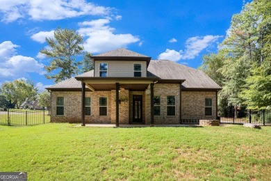 Discover this stunning Craftsman-style home featuring 4 bedrooms on Canongate At Georgia National Golf Club in Georgia - for sale on GolfHomes.com, golf home, golf lot