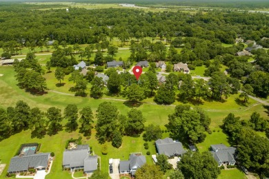 Nestled within a prestigious golf community, this immaculate on Wedgefield Plantation Golf Club in South Carolina - for sale on GolfHomes.com, golf home, golf lot