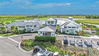 Welcome to elegant coastal living in sought after Fiddler's on The Golf Club At Fiddlers Creek in Florida - for sale on GolfHomes.com, golf home, golf lot
