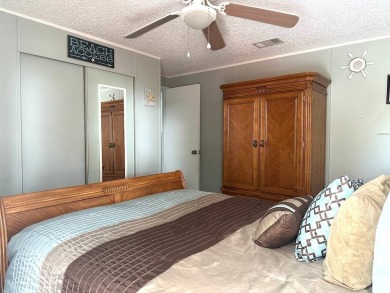 STEP INTO THIS BEAUTIFULLY UPDATED 2-BEDROOM 2-BATHROOM HOME! on Anglers Green Golf Course in Florida - for sale on GolfHomes.com, golf home, golf lot