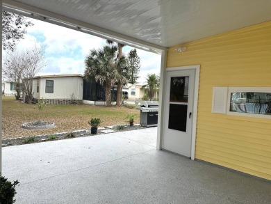 STEP INTO THIS BEAUTIFULLY UPDATED 2-BEDROOM 2-BATHROOM HOME! on Anglers Green Golf Course in Florida - for sale on GolfHomes.com, golf home, golf lot