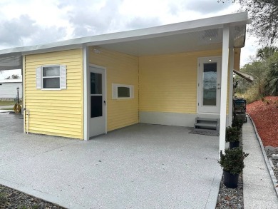 STEP INTO THIS BEAUTIFULLY UPDATED 2-BEDROOM 2-BATHROOM HOME! on Anglers Green Golf Course in Florida - for sale on GolfHomes.com, golf home, golf lot