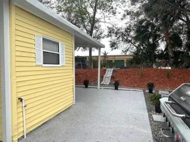 STEP INTO THIS BEAUTIFULLY UPDATED 2-BEDROOM 2-BATHROOM HOME! on Anglers Green Golf Course in Florida - for sale on GolfHomes.com, golf home, golf lot