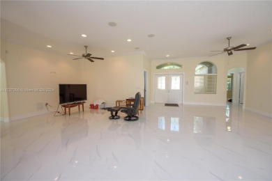 Reduced!! Luxurious Palm Isles Estates in Keys Gate. This 4 on Keys Gate Golf Club in Florida - for sale on GolfHomes.com, golf home, golf lot