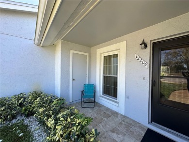 Enjoy maintenance-free living in this well-maintained 2-bedroom on Beacon Woods Golf Club in Florida - for sale on GolfHomes.com, golf home, golf lot