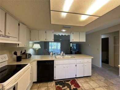 Enjoy maintenance-free living in this well-maintained 2-bedroom on Beacon Woods Golf Club in Florida - for sale on GolfHomes.com, golf home, golf lot