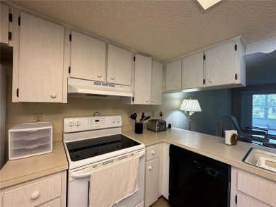 Enjoy maintenance-free living in this well-maintained 2-bedroom on Beacon Woods Golf Club in Florida - for sale on GolfHomes.com, golf home, golf lot