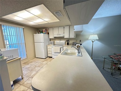 Enjoy maintenance-free living in this well-maintained 2-bedroom on Beacon Woods Golf Club in Florida - for sale on GolfHomes.com, golf home, golf lot