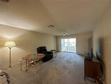 Enjoy maintenance-free living in this well-maintained 2-bedroom on Beacon Woods Golf Club in Florida - for sale on GolfHomes.com, golf home, golf lot