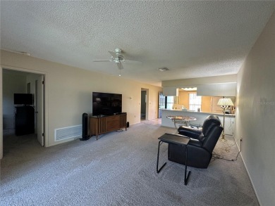 Enjoy maintenance-free living in this well-maintained 2-bedroom on Beacon Woods Golf Club in Florida - for sale on GolfHomes.com, golf home, golf lot