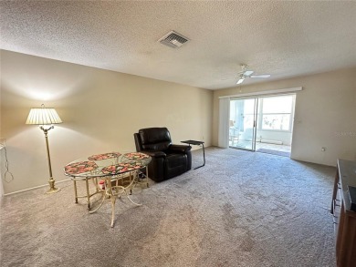 Enjoy maintenance-free living in this well-maintained 2-bedroom on Beacon Woods Golf Club in Florida - for sale on GolfHomes.com, golf home, golf lot
