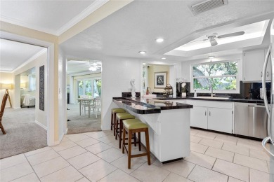 Put this at the top of your list to tour! Inventory remains on The Dunedin Country Club in Florida - for sale on GolfHomes.com, golf home, golf lot