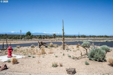 Enjoy Cascade Mountain & Ridge views off the 18th green at on Brasada Canyons Golf Course in Oregon - for sale on GolfHomes.com, golf home, golf lot