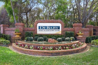 Discover luxury living in the exclusive gated community of on DeBary Golf and Country Club in Florida - for sale on GolfHomes.com, golf home, golf lot