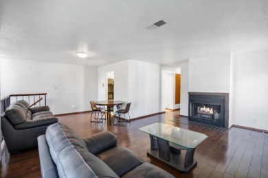 This stylish penthouse townhouse features 2 bedrooms and 1.5 on Arroyo Del Oso Golf Course in New Mexico - for sale on GolfHomes.com, golf home, golf lot