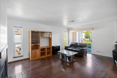 This stylish penthouse townhouse features 2 bedrooms and 1.5 on Arroyo Del Oso Golf Course in New Mexico - for sale on GolfHomes.com, golf home, golf lot