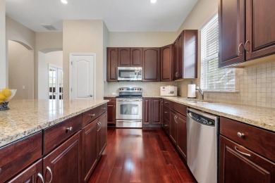 This meticulously maintained Southwood home overlooks the golf on Southwood Golf Club in Florida - for sale on GolfHomes.com, golf home, golf lot