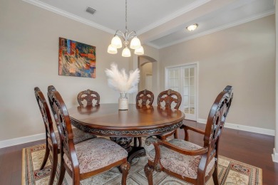 This meticulously maintained Southwood home overlooks the golf on Southwood Golf Club in Florida - for sale on GolfHomes.com, golf home, golf lot
