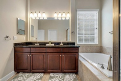 This meticulously maintained Southwood home overlooks the golf on Southwood Golf Club in Florida - for sale on GolfHomes.com, golf home, golf lot