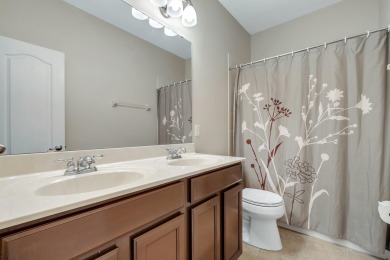 This meticulously maintained Southwood home overlooks the golf on Southwood Golf Club in Florida - for sale on GolfHomes.com, golf home, golf lot