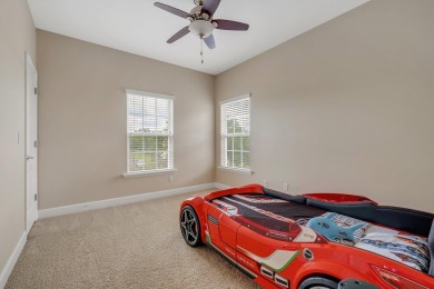 This meticulously maintained Southwood home overlooks the golf on Southwood Golf Club in Florida - for sale on GolfHomes.com, golf home, golf lot