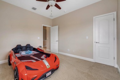 This meticulously maintained Southwood home overlooks the golf on Southwood Golf Club in Florida - for sale on GolfHomes.com, golf home, golf lot
