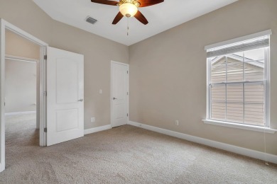 This meticulously maintained Southwood home overlooks the golf on Southwood Golf Club in Florida - for sale on GolfHomes.com, golf home, golf lot