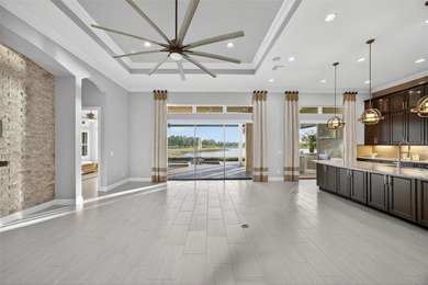 Discover unparalleled luxury in this exquisite Lakewood Ranch on Esplanade Golf and Country at Lakewood Ranch in Florida - for sale on GolfHomes.com, golf home, golf lot