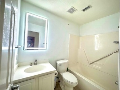 Beautifully updated end-unit townhome in a wonderful north Plano on Ridgeview Ranch Golf Club in Texas - for sale on GolfHomes.com, golf home, golf lot