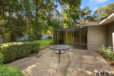 Nestled among mature trees, this charming 3-bedroom, 2-bath home on Hide-A-Way Lake Golf Course in Texas - for sale on GolfHomes.com, golf home, golf lot
