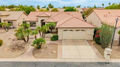 Beautiful landscaping greets you into this popular Palmera model on Oakwood Golf Club  in Arizona - for sale on GolfHomes.com, golf home, golf lot