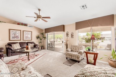 Beautiful landscaping greets you into this popular Palmera model on Oakwood Golf Club  in Arizona - for sale on GolfHomes.com, golf home, golf lot