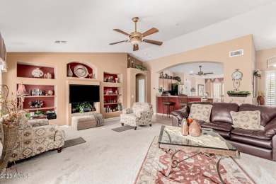 Beautiful landscaping greets you into this popular Palmera model on Oakwood Golf Club  in Arizona - for sale on GolfHomes.com, golf home, golf lot