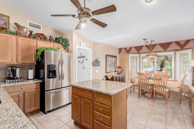 Beautiful landscaping greets you into this popular Palmera model on Oakwood Golf Club  in Arizona - for sale on GolfHomes.com, golf home, golf lot