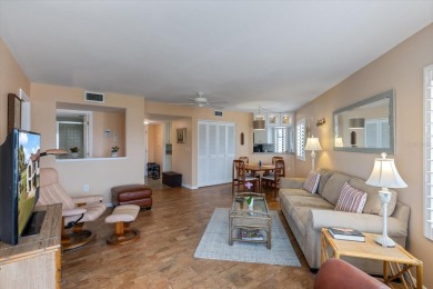 This spacious and immaculately maintained condo is positioned on Capri Isle Golf Club in Florida - for sale on GolfHomes.com, golf home, golf lot