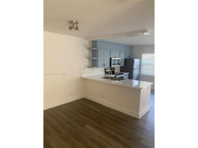 A must see recently renovated corner unit townhouse at Stamford on Bear Lakes Country Club in Florida - for sale on GolfHomes.com, golf home, golf lot