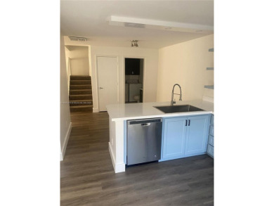 A must see recently renovated corner unit townhouse at Stamford on Bear Lakes Country Club in Florida - for sale on GolfHomes.com, golf home, golf lot