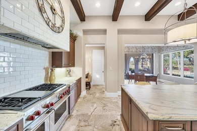 An exceptional former London Bay Homes model, this fully on The Founders Golf Club in Florida - for sale on GolfHomes.com, golf home, golf lot