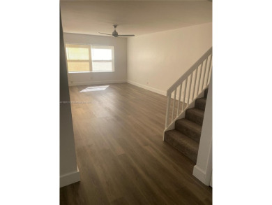 A must see recently renovated corner unit townhouse at Stamford on Bear Lakes Country Club in Florida - for sale on GolfHomes.com, golf home, golf lot