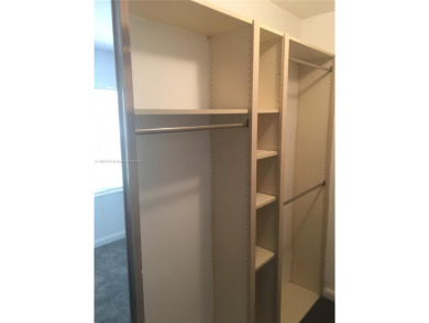 A must see recently renovated corner unit townhouse at Stamford on Bear Lakes Country Club in Florida - for sale on GolfHomes.com, golf home, golf lot