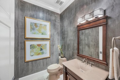 An exceptional former London Bay Homes model, this fully on The Founders Golf Club in Florida - for sale on GolfHomes.com, golf home, golf lot