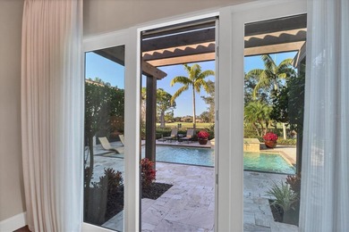 An exceptional former London Bay Homes model, this fully on The Founders Golf Club in Florida - for sale on GolfHomes.com, golf home, golf lot