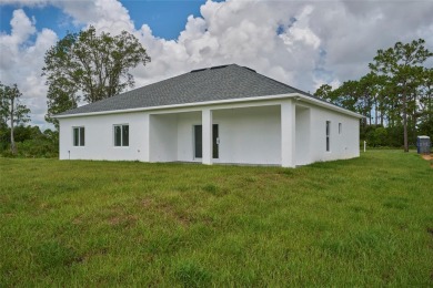 Beautiful new construction in Indian Lake Estates! A golf and on Indian Lake Estates Golf and Country Club in Florida - for sale on GolfHomes.com, golf home, golf lot