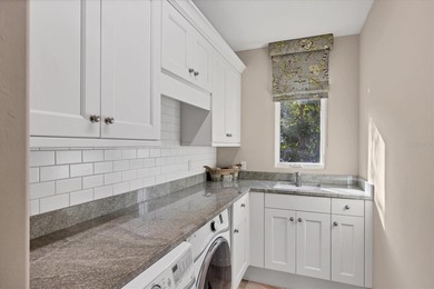 An exceptional former London Bay Homes model, this fully on The Founders Golf Club in Florida - for sale on GolfHomes.com, golf home, golf lot